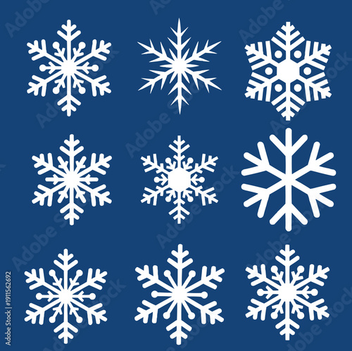 Collection of Vector Snowflake Icons on Dark Blue Background.