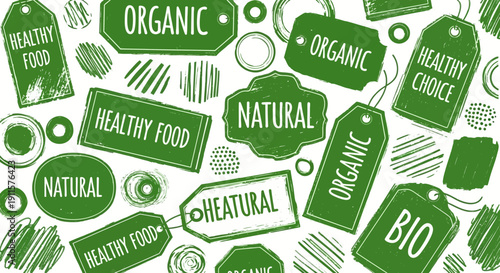 Assorted green labels and tags with organic and natural food themes, scattered in a collage on a clean background, viewed from directly above