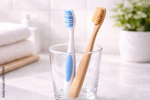 Toothbrush bathroom dental care concept hygiene healthy clean morning glass cup dental care concept hygiene healthy clean morning routine with toothbrush in glass on bright bathroom counter