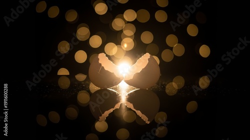 Cracked egg glowing with bright inner light against golden bokeh background