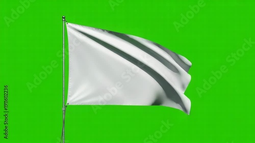 White flag waving on silver pole against green background