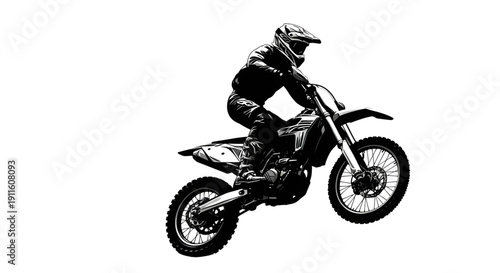 Action motocross rider silhouette kicking up dirt and dust in a high speed maneuver