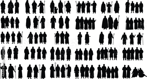 Black silhouettes of people in robes shepherds staffs