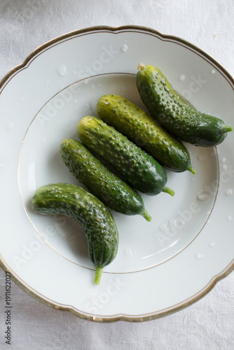 Top view of fermented gherkins on a plate