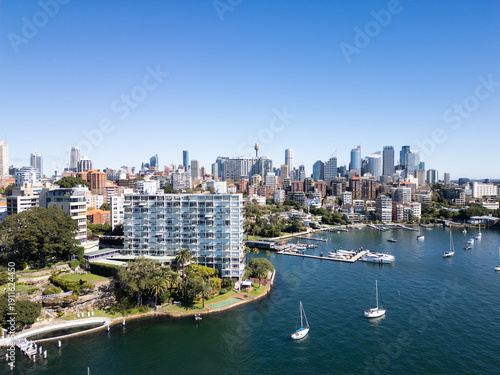 Sydney, Australia: Aerial view of luxury apartment by the Elizabeth Bay marina with the Sydney business district skyline in Australia on a sunny day.