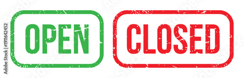 Green open and red closed rubber stamps on white background