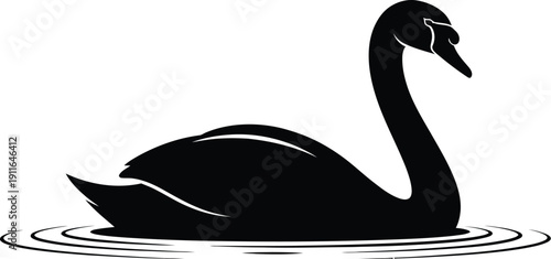 A serene black swan floats on calm waters with gentle ripples from a peaceful lake view