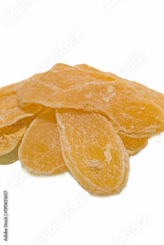 Dried Ginger Leafs With Sugar Powder and Placed Heaped Over Reflective Surface As Concepts of Healthy Eating