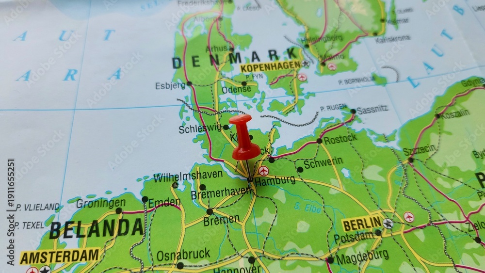 Naklejka premium View of Hamburg, City and state in the North of Germany, on a geographical map of Europe, marked with red pushpin