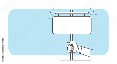 Hand holding a blank white sign on a wooden pole against a light blue background for protest message, advertising, or important announcement info.