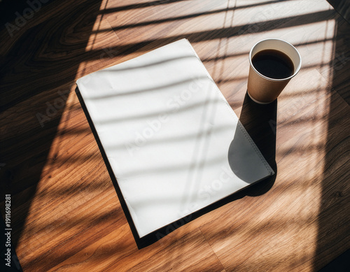 Aesthetic blank newspaper mockup with coffee cup and window blind shadows