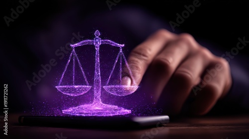 Digital Justice - Scales of Justice Hologram on Smartphone with Hand.