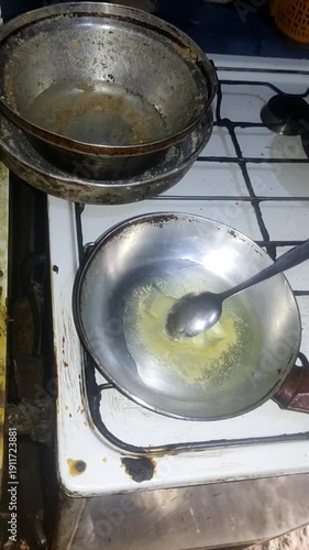 Close-Up of Eggs Frying in a Pan with Sizzling Oil, Homemade Breakfast
