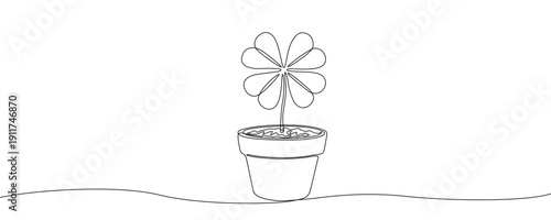 Four-leaf clover in a pot in one line art style. Drawing of a lucky plant, made by a continuous line with editable black stroke on a white background. Vector illustration.