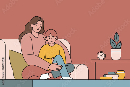 A mother and son sit closely together on a cream colored sofa