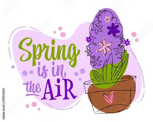 Spring Is In The Air. Spring is celebrated through playful lettering in green and purple. The text features a mix of charming, modern script and bold typography