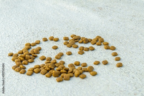 Pet food shaped like a heart on concrete