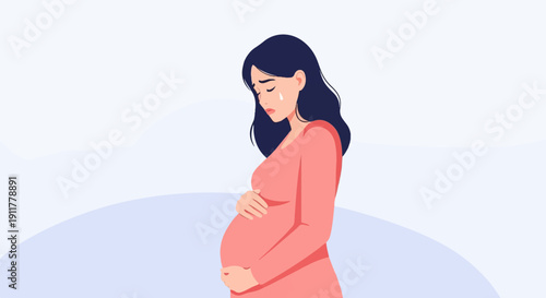 Pregnant woman crying, holding her belly, looking down sadly