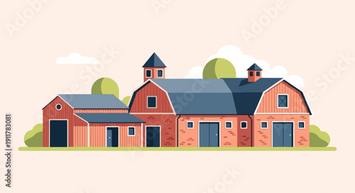 Rustic red barns with blue roofs under a pale sky with clouds