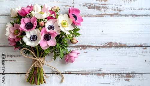 Beautiful spring anemones with green leaves high resolution picture