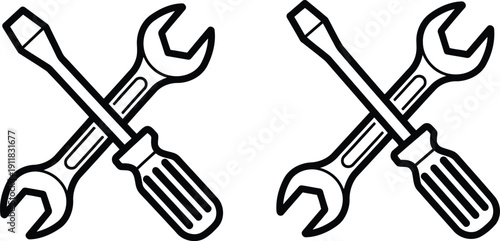 Crossed wrench and screwdriver tools repair maintenance