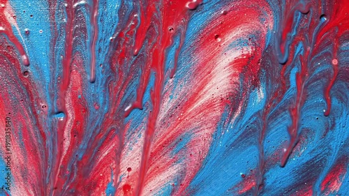 Abstract painting with vivid red and blue swirls displaying dynamic motion and texture. Concept of artistic expression, creativity, or vibrant design.