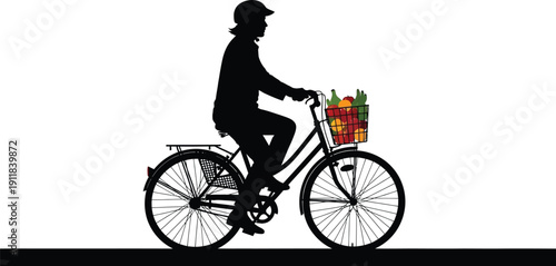 Person riding a bicycle with a basket full of fresh fruits and bottles