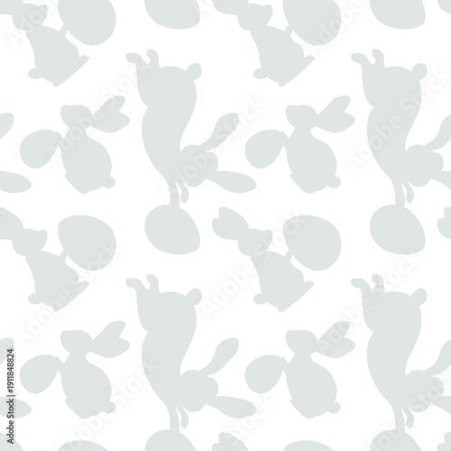 Seamless minimalist vector pattern featuring light gray bunny silhouettes in various poses and Easter eggs. Subtle holiday design for textiles and nursery decor.