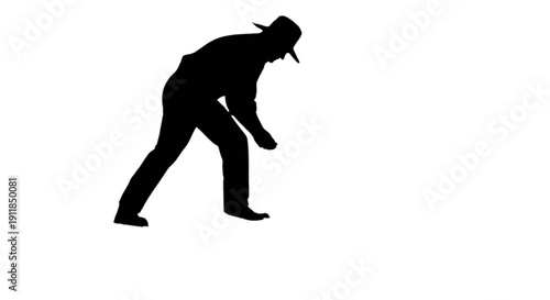 Silhouette of a person bending over with a hat
