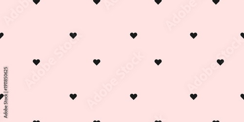 Minimal black heart seamless pattern on soft pink background, for Valentine cards, textile design, wrapping paper, fabric print, packaging, social media web banners, nursery decor.Vector illustration