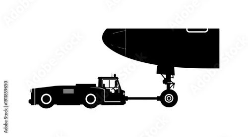 Aircraft Tow Tractor Connected to a Commercial Airplane