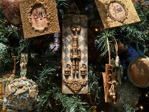 Antique holiday decorations, Ancient brass jewelry pieces amidst holiday seasonal embellishments