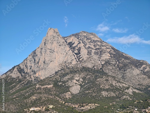 Skyline with moon and slopes, Elevated summit with celestial body and peaceful nature surroundings