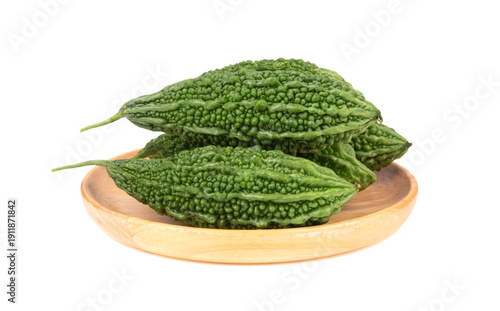 Fresh bitter gourd Bitter cucumber or bitter melon with cut slice isolated on a white background