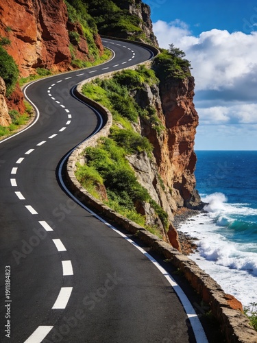 A winding road with a cliff in the background