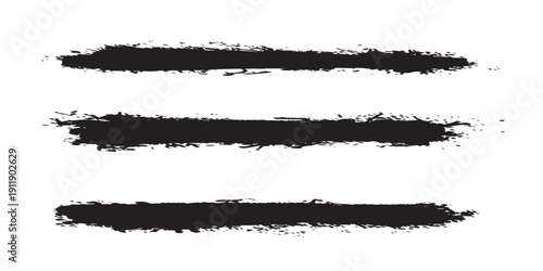 Set of three hand-drawn black grunge brush strokes on a white background perfect for artistic designs and textures.