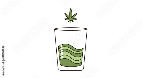 Green liquid with cannabis leaf in a glass