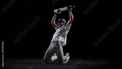 Foto Cricket player kneeling on dark background celebrating decisive win