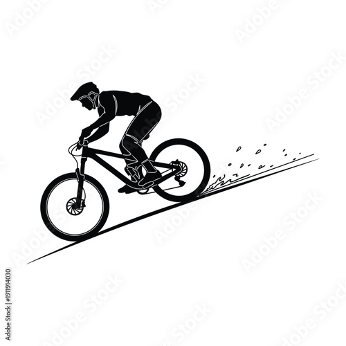 Mountain biker descending a steep slope, kicking up dust.