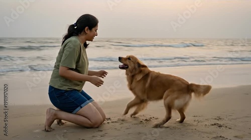 Joyful Woman Playing with Her Golden Retriever on a Serene Sandy Beach at Golden Hour