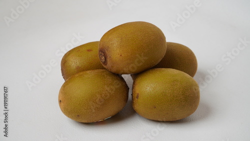 Tableau sur toile Golden kiwi or also known as yellow kiwi, has a softer texture and a sweeter, less bitter taste compared to green kiwi isolated on a white background