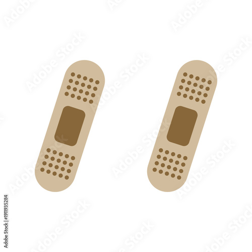 Two beige band aids with brown adhesive and ventilation holes