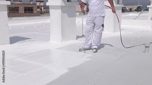 Applying White Reflective Roof Coating for Waterproof Hydroinsulation Protection