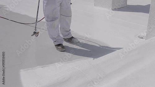 Applying White Reflective Roof Coating for Waterproof Hydroinsulation Protection