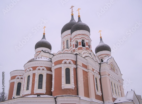 Фотография Saint Nicholas orthodox cathedral with onion dome towers on a winter evening in