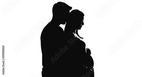 A pregnant woman and man standing together in a loving silhouette