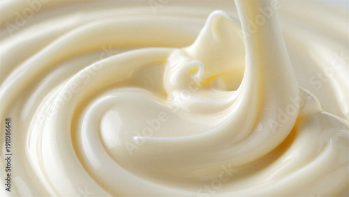 Canvastavla Pouring thick, white cream or yogurt in a swirling motion, close-up