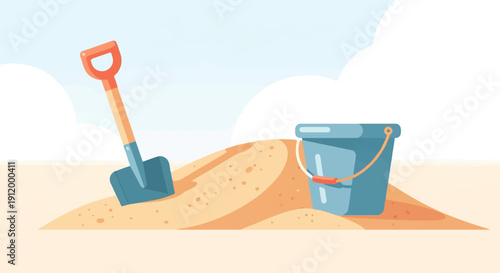 Sunny day at the beach with a shovel and bucket on sand dunes