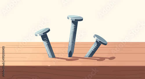 Three metallic nails embedded in a wooden surface under a light background