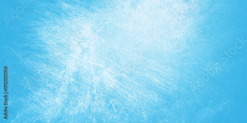 An abstract blue watercolor and grunge background featuring a cold winter sky texture with white frozen ice patterns and bright ocean wave clouds on paper wallpaper